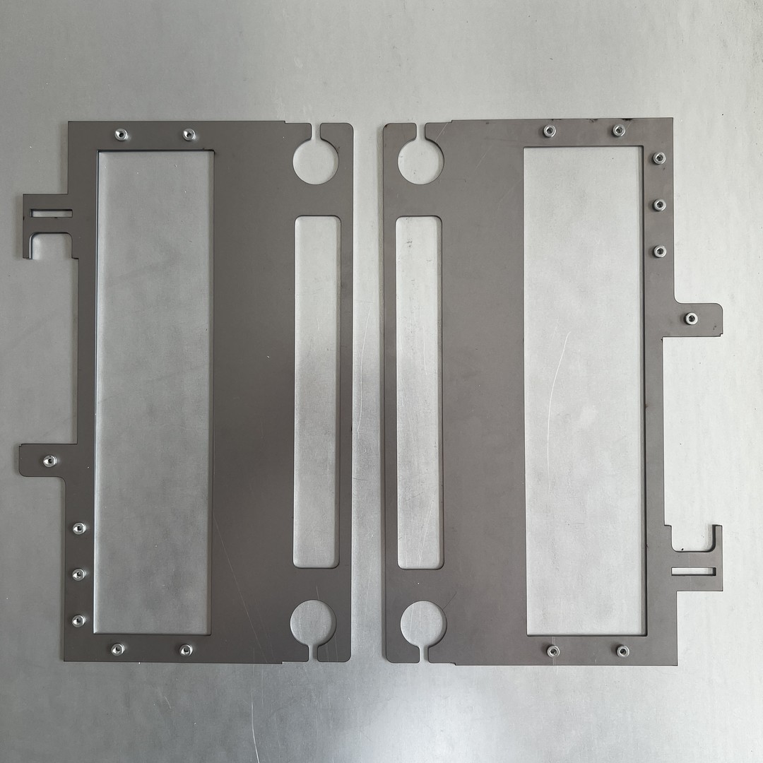 Parti metalliche stampate a piegatura CNC personalizzate